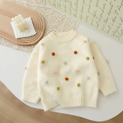 Childrens round-neck pullover sweater with colorful dots and long sleeves