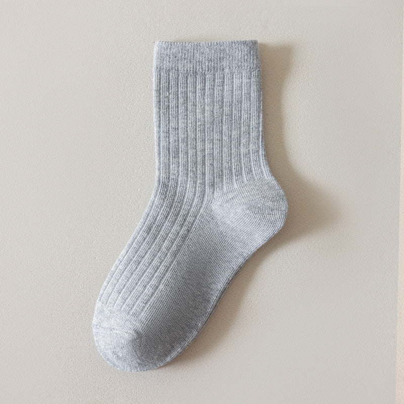 Children's socks, autumn and winter style, classic white socks for boys and girls, students, solid color, Class A cotton mid-calf socks, sports socks, sweat-absorbent and odor-resistant.