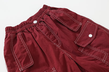New summer children's handsome and versatile stitching cargo shorts, loose thin five-point pants for big boys